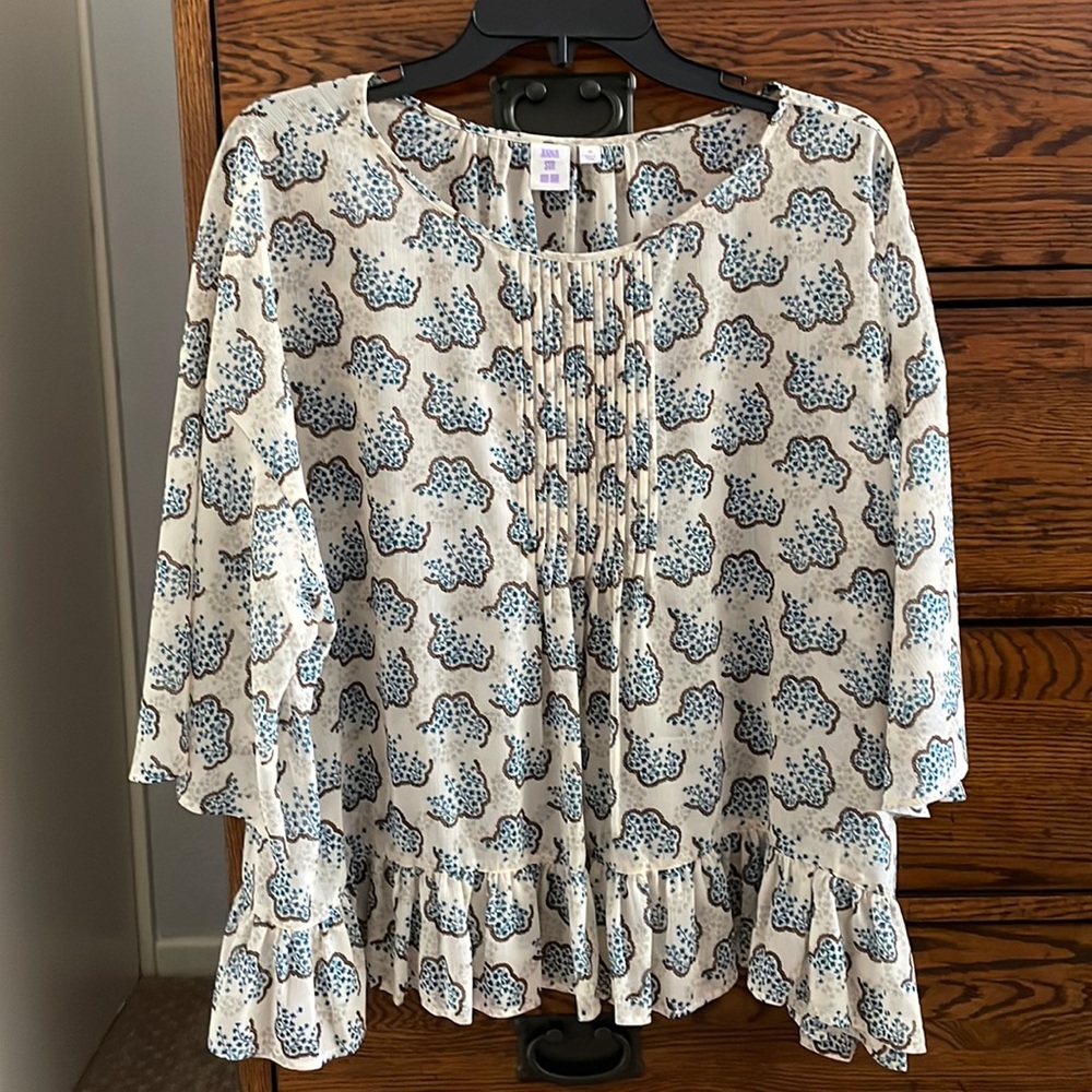 Feminine & Delicate. Semi-Sheer Floral Blouse